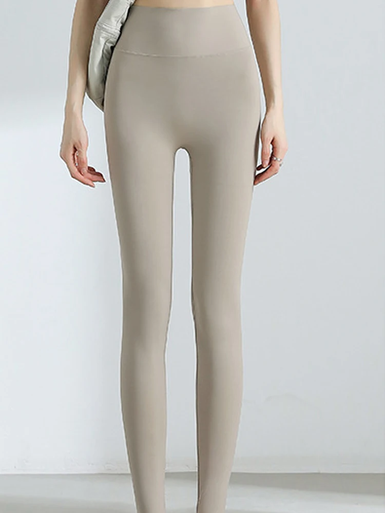 กางเกงโยคะเอวสูงผ้าไหมน้ำแข็งบางเบา รุ่นใหม่ ปี 2025 สำหรับผู้หญิง กระชับสัดส่วน ยกกระชับสะโพก กางเกง 9 ส่วน ผ้าไนลอนผสมสแปนเด็กซ์