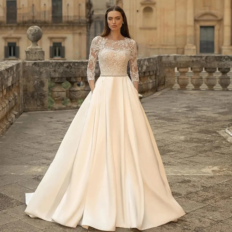 Elegante ilusión O cuello vestidos de novia para mujer elegante hecho a medida mangas largas apliques con cordones vestido de novia bolsillos satén