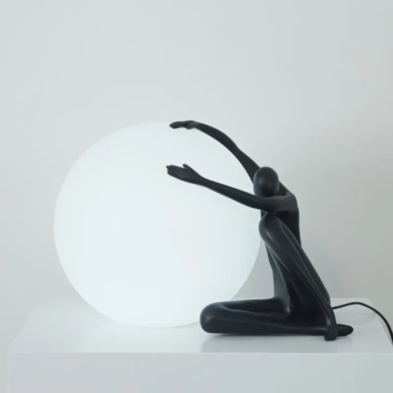 Simple modern humanoid ball holding living room bedroom bedside table lamp