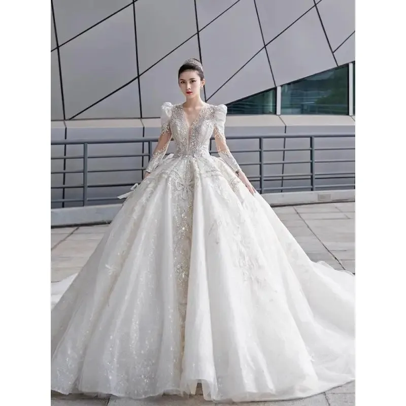 Customized 2026 Long Sleeved Palace Wedding Dress New Bridal Vintage Luxury Starry Sky Bright Diamond Heavy Work Big Tail Female