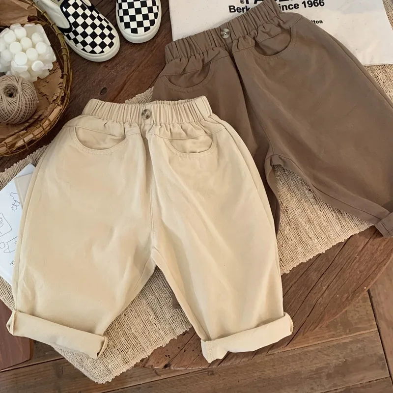 

Children's trousers boys' 2023 spring new children's cotton trousers girls' casual pants pure color and foreign style