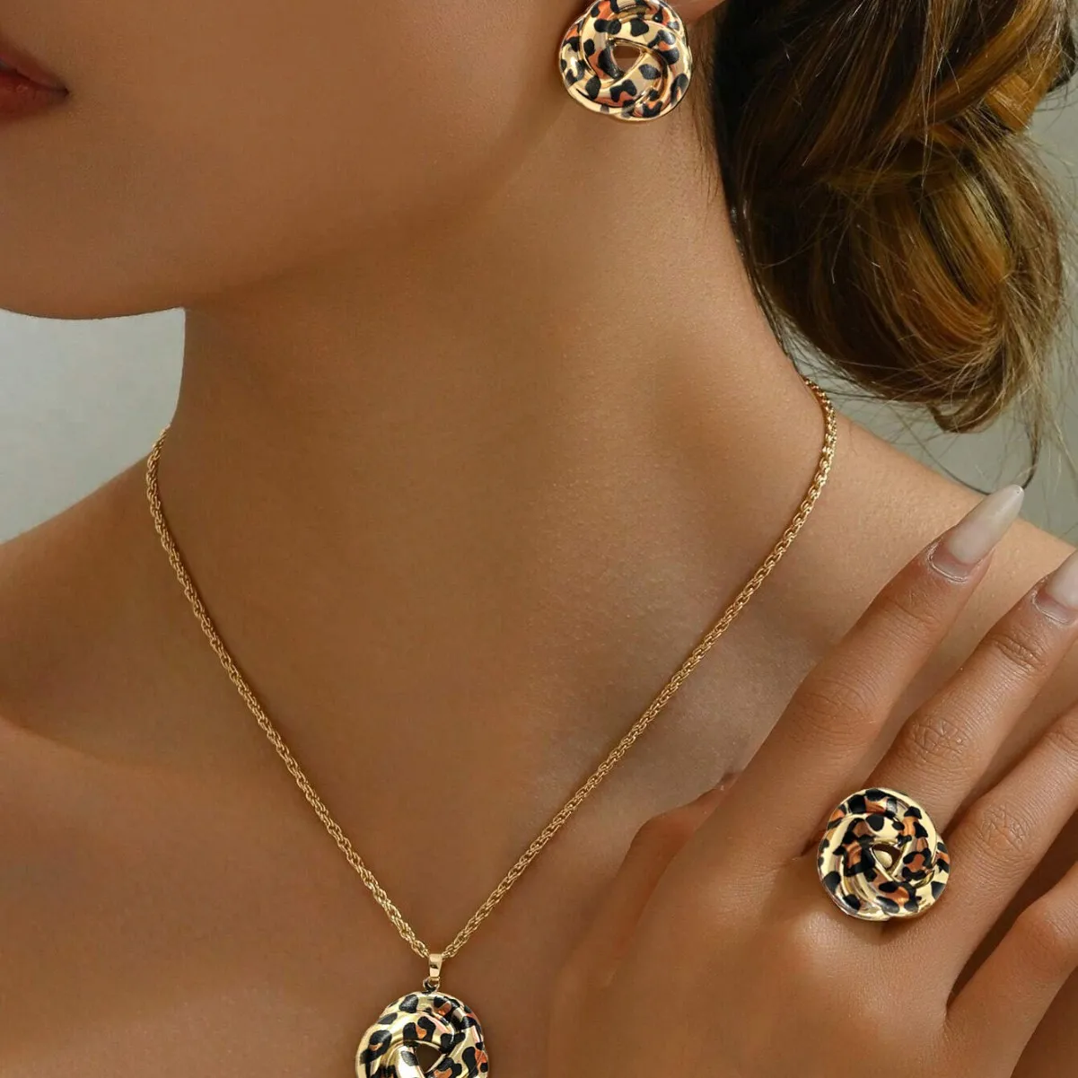 Simple and stylish knotted earrings irregular leopard print ring pendant necklace set