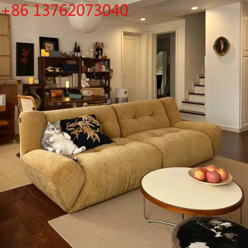 

French cream retro, designer small apartment, cloud fabric, simple cat scratching cloth, light luxury triple sofa