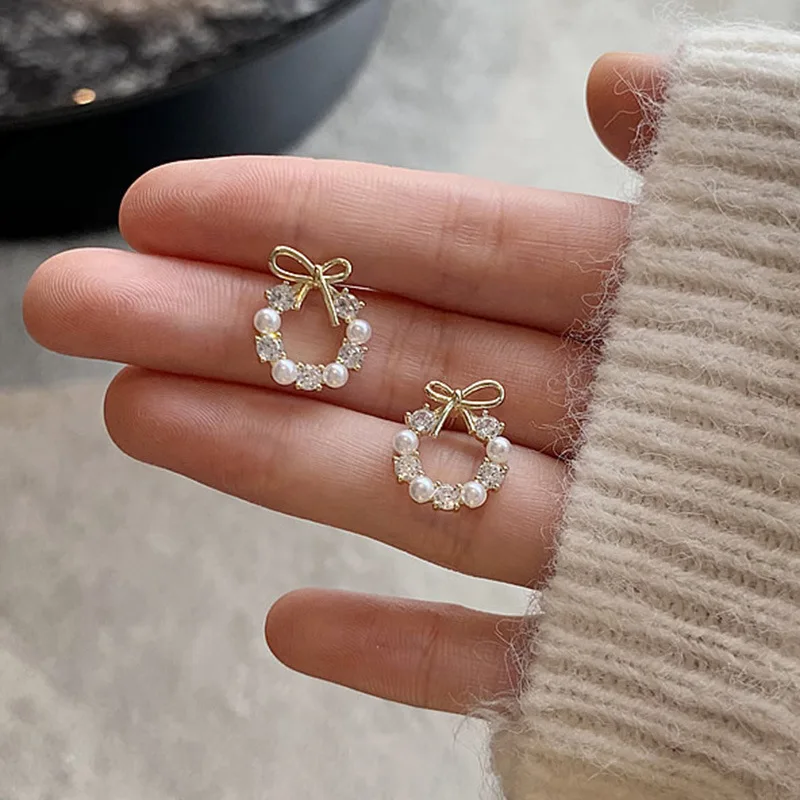 Hollow Out Round Rhinestones Bow Stud Earrings for Women Temperament Fashion Imitation Pearl Ear Studs Party Wedding Jewely K1 Image 5