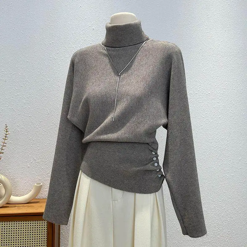 

Women Solid Color Turtleneck Pullover Sweater Fashion Temperament Button Design Slimming Tops New Irregular Long Sleeve Knitwear