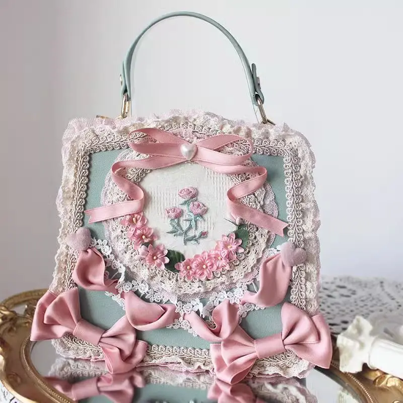 Vintage vittoriano Lolita borse donna elegante fiocco fiore pizzo ricamo borsa Cosplay palazzo principessa Tea Party Dance Bag