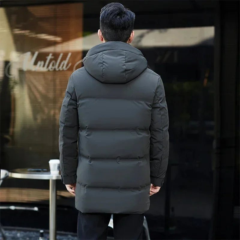 Chaqueta de plumón larga con capucha para hombre, abrigo grueso y cálido con protección contra el frío, de diseño de lujo, color negro, invierno, novedad de 2025