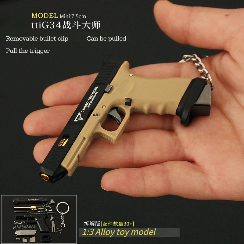 

New Mini Gun Pendant 1:3 Nylon Gun Simulation Model Half Alloy G34 Battle Master Metal Keychain Family Small Ornament Collection