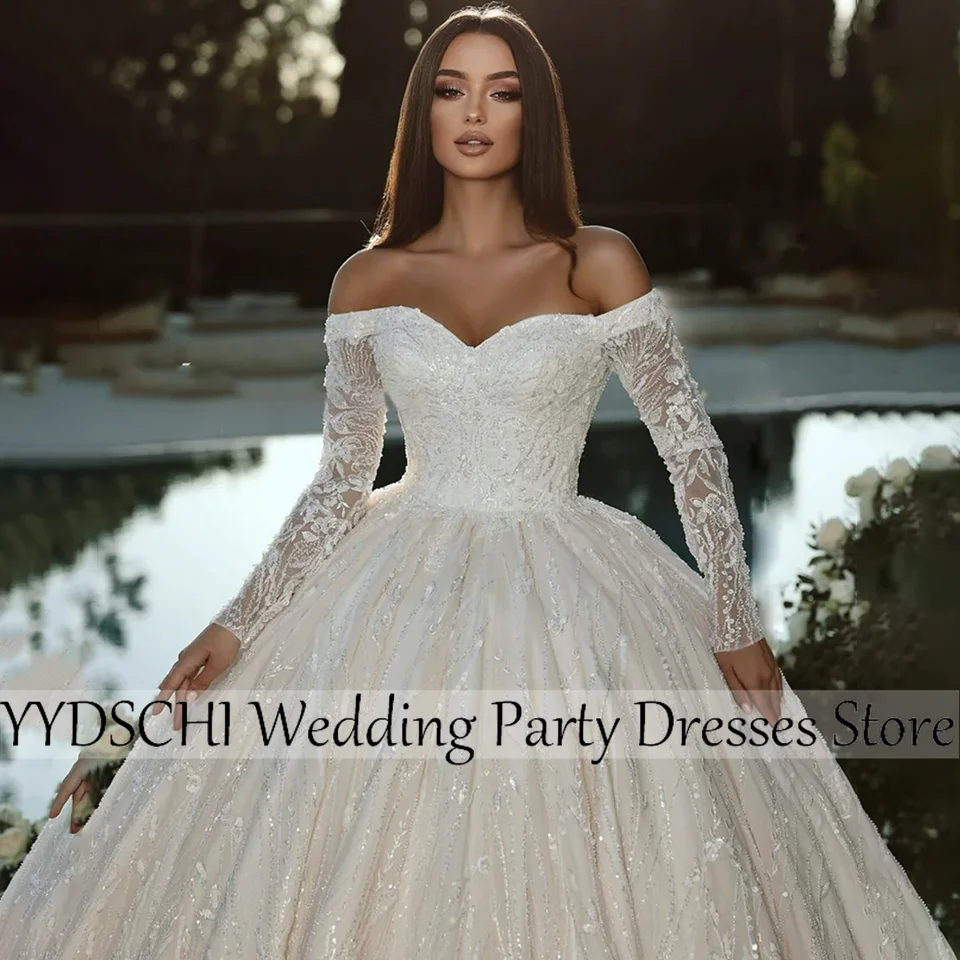 Robes de mariée 2025 Sexy longue traîne robe de mariée robe de plage exquise robe de bal robes dos nu robes de mariée pour les femmes 2025