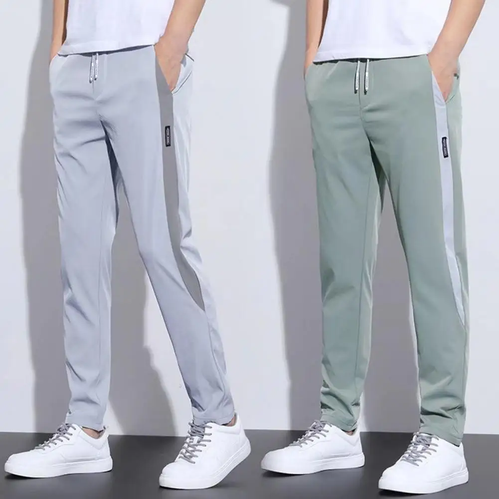 

Korean Style Men Pants Color Matching Drawstring High Waist Pockets Summer Stretchy Sweatpants Loose Trousers Male Streetwear