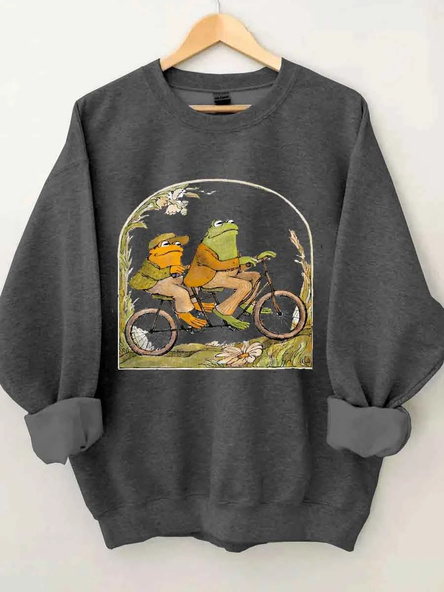 Vintage Cute Cartoon Two Frogs on A Bike Ride in Spring Print Women Sweatshirt Retro Elegance Spring Trip Comfort Female Sweater