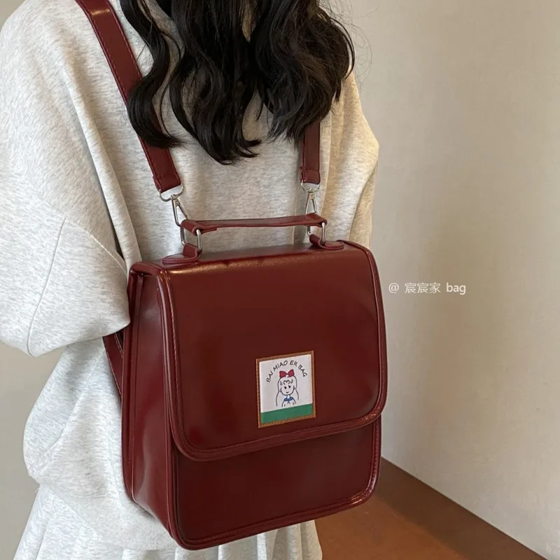 Mochila de piel sintética con imagen de dibujos animados, bolso de hombro cruzado de gran capacidad, estilo japonés coreano, ideal para estudiantes, novedad de 2024