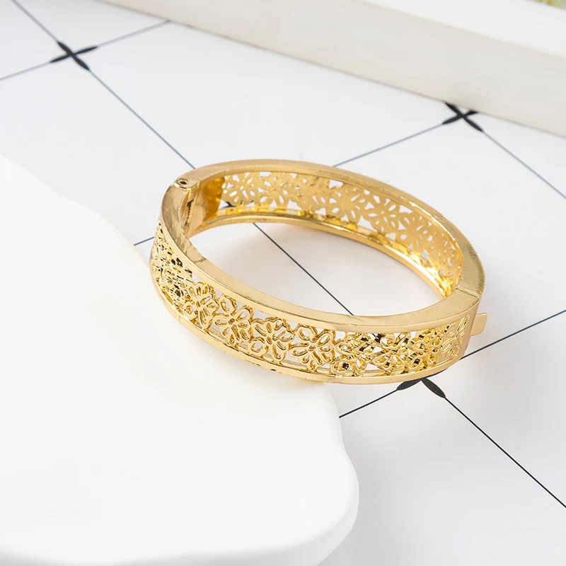 

Premium Golden Plated Bangle Intricate Floral Hollow Design Elegant Ethnic Jewelry For Arabic Bridal Middle Eastern Fashion