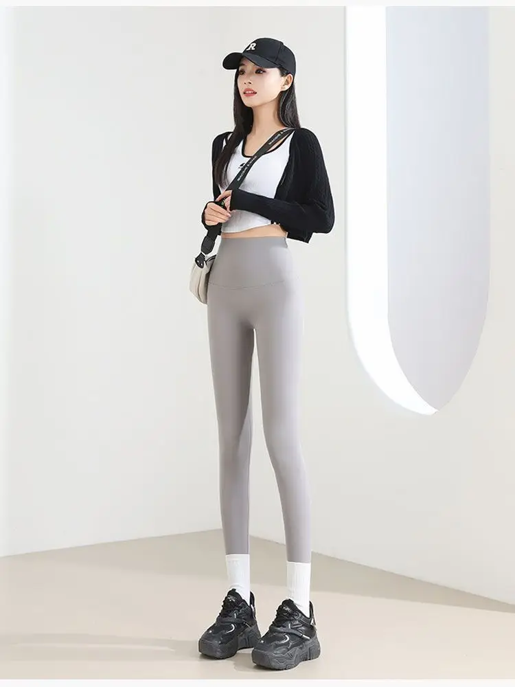 กางเกงเลกกิ้งผู้หญิงสีขาวทรงเข้ารูปสำหรับออกกำลังกาย กางเกงขายาวทรงสปอร์ต ซิปหลัง กระชับรูปร่าง ใส่ทำงานได้ เนื้อผ้านุ่มฟู เหมาะกับฤดูใบไม้ร่วง เอวสูง