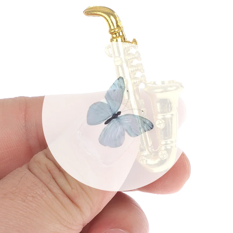 

Mini Guitar Violin Trumpet Doll Musical Instrument Music Dolls House Bar Doll