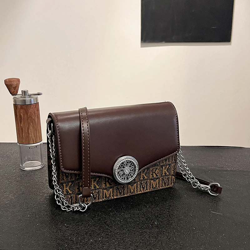 

Trendy Solid Color Crossbody Handbag For Fashionable Women Featuring Letter Logo And Lightweight Comfort