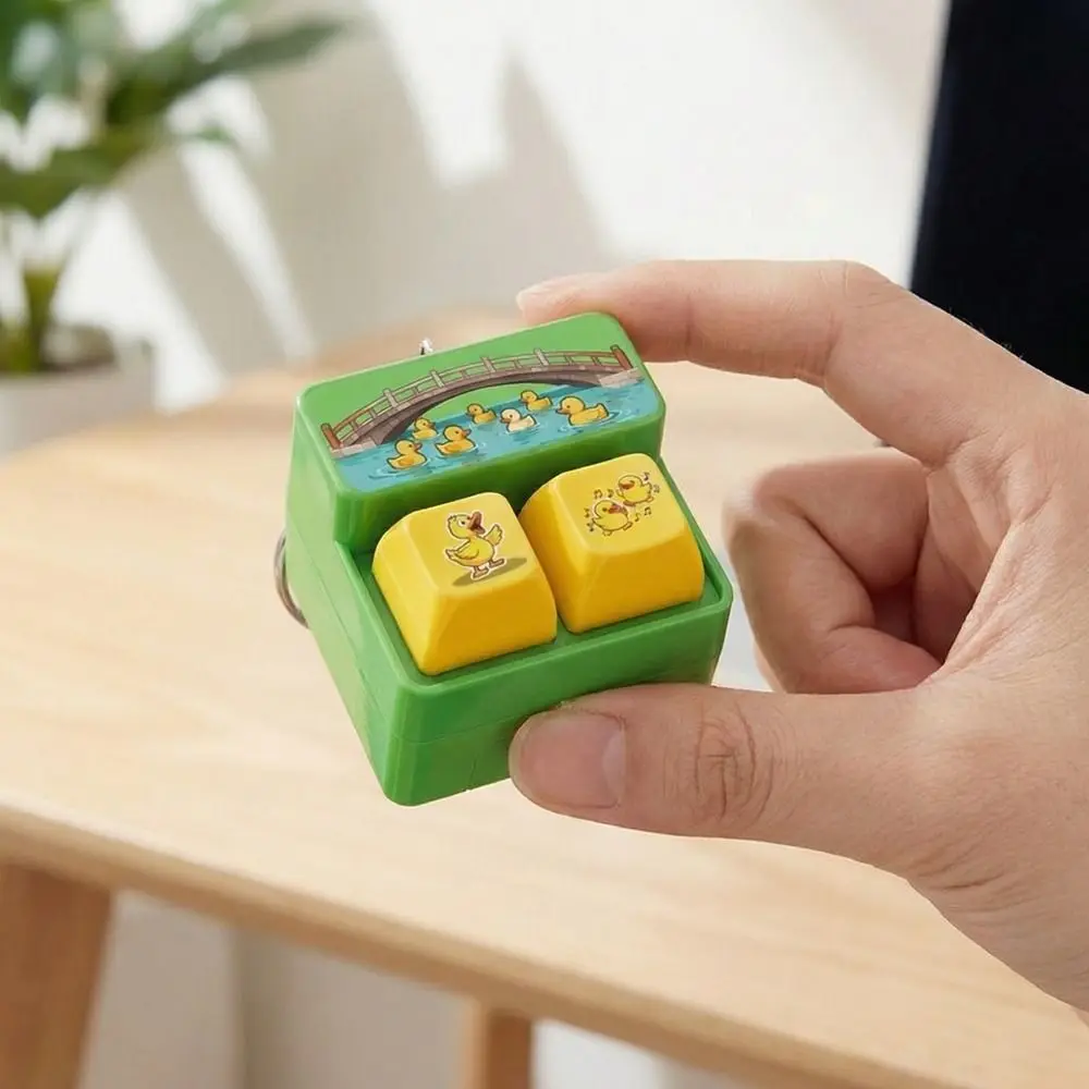 Fingertip Button Keyboard Games Keychain with LED Light Plastic Voice-Activated Keychain Portable Cartoon Phone Stand