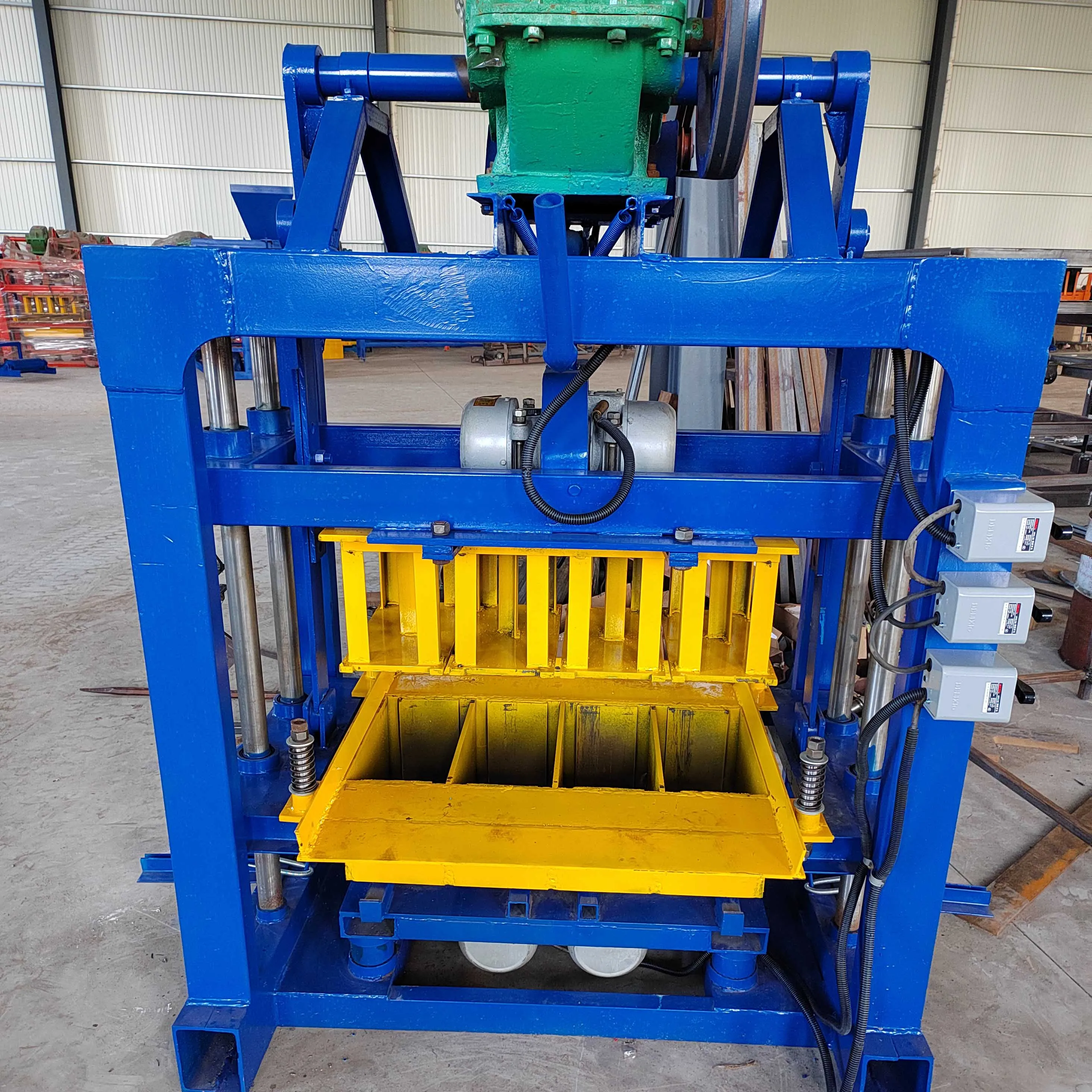 

Concrete Block Molding Machine Brick Making Machine for Making Bricks Interlocking Brick Making Machine