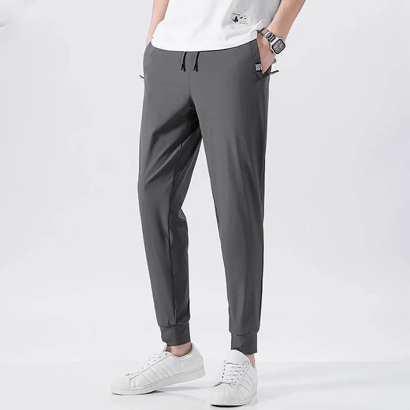 2024 plus-size fashion brand simple slim-fit sports pants Spring and autumn new all-in-one bundle feet loose casual pants