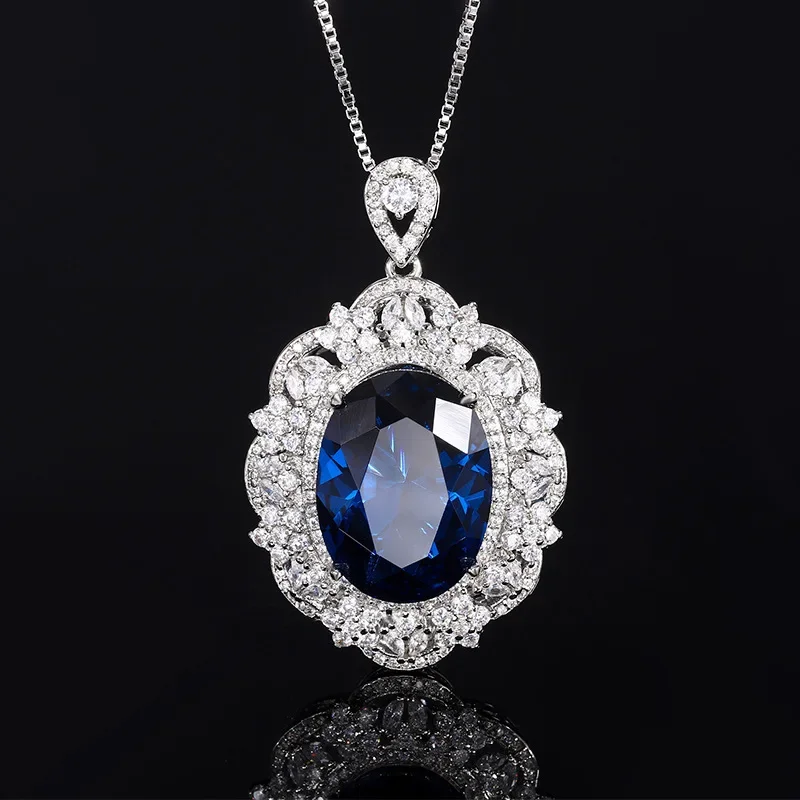 

Luxury Oval Gemstone Pendant Necklaces with Intricate Silver Plating Featuring Red Blue Crystals Perfect for Elegant Jewelry