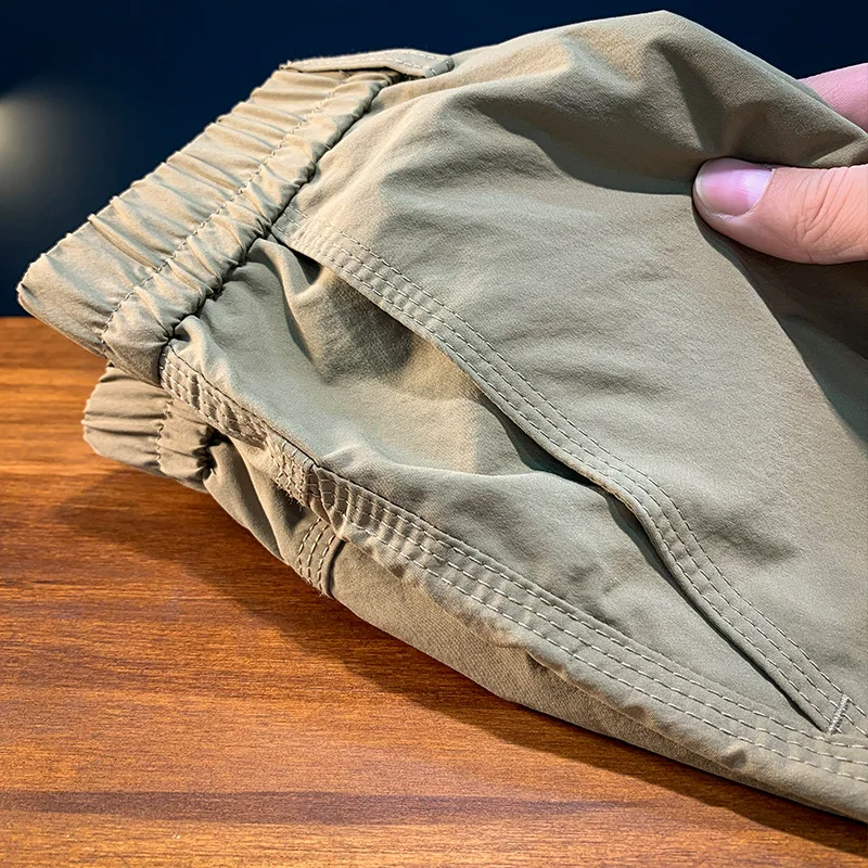 2024 estate nuovi pantaloni Casual da uomo alla caviglia di grandi dimensioni Cargo sciolto tinta unita moda pantaloni sportivi versatili alla moda