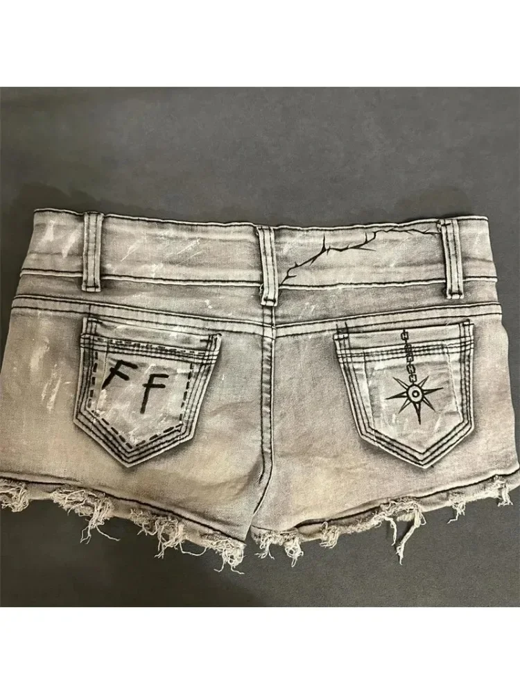 Moda coreana cintura baixa picante menina borla calças quentes verão retro angustiado fino ajuste impresso high street shorts jeans feminino