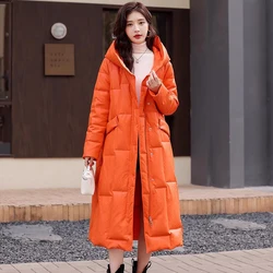 Nueva Mujer Invierno Naranja Cuero Abajo Abrigo Moda Casual con capucha suelta caliente de piel de oveja de pato blanco Abajo Abrigo Cuero partido