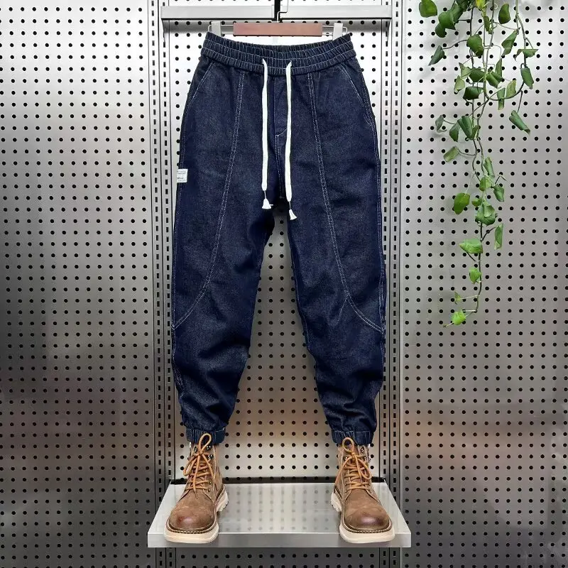 

Новое поступление 2025 года, мужские осенние модные потертые синие свободные брюки Харрингтон с эластичной резинкой на талии и капюшоном