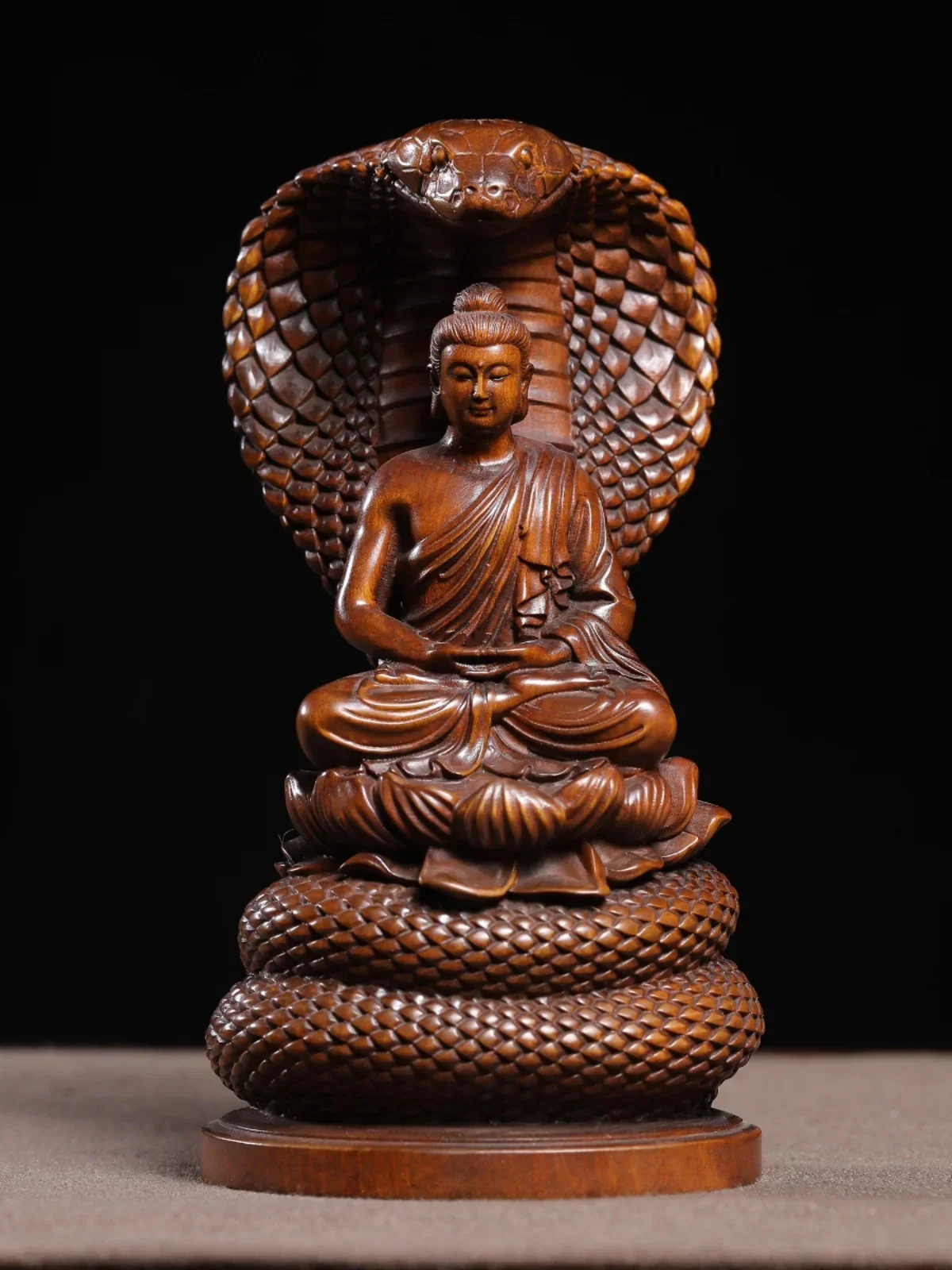 

Ancient snake Buddha carved wooden imitation of ancient Buddha