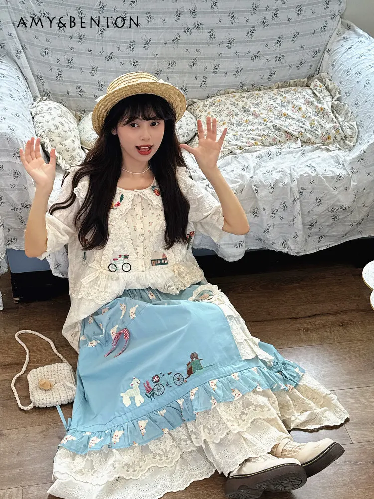 

2026 Summer New Style Forest-themed Sweet Girl Light Blue Multi-layered Lace Trim Bow Cartoon Print Loose Casual Skirt