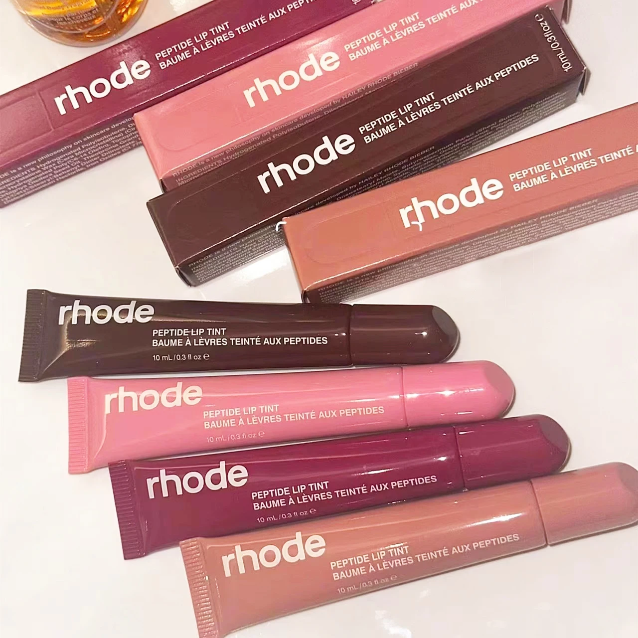 New Color Rhode Lip Glosses Plump Moisturizing Lip Glaze Essence Gel Oil Long Lasting Nourishing Lipstick Gloss Care Makeup Girl