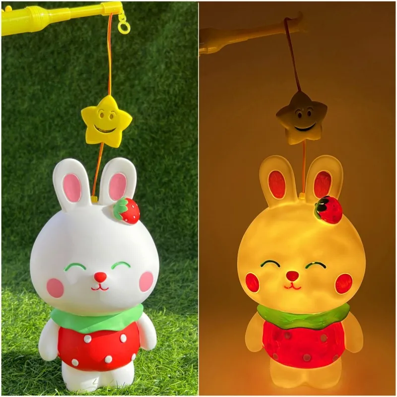 New Christmas Cartoon Cute Strawberry Skirt White Rabbit Coin Bank Handhold Lantern Toys For Kids With Music And Lights Toys