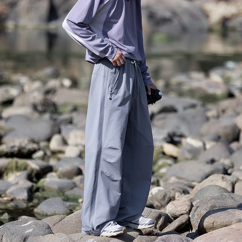 

Мужские и женские водонепроницаемые быстросохнущие спортивные брюки для походов, свободные повседневные брюки в стиле techwear, с боковой молнией, для активного отдыха, карго-брюки.