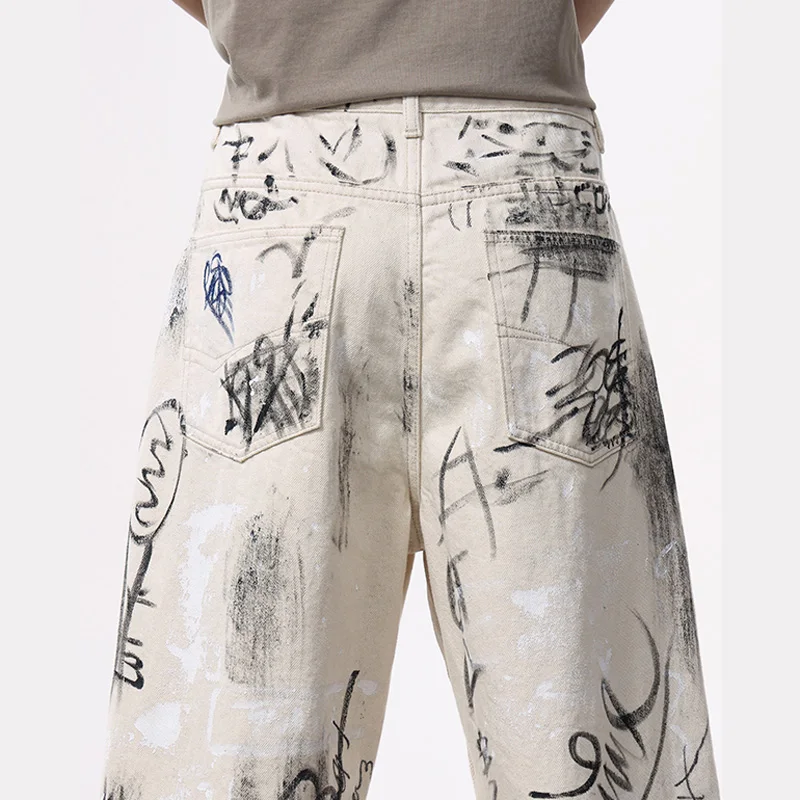 Celana jins pria, celana jins Denim longgar kasual Hip Hop, celana jins Streetwear mode, celana Graffiti jalanan Amerika