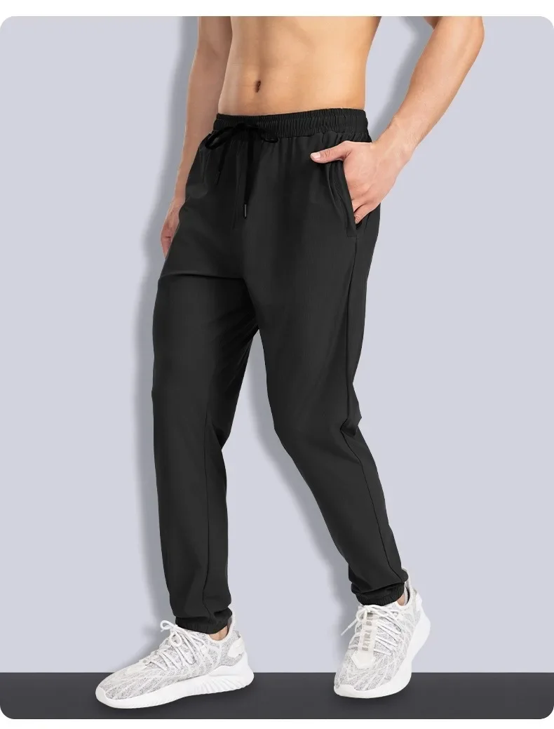 

Мужские быстросохнущие повседневные облегающие спортивные брюки, дышащие длинные брюки для бега и фитнеса на шнурке.