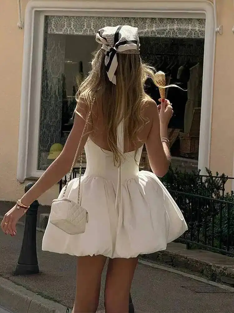 セクシーなバブルヘムミニドレスレディエレガントなバックレスノースリーブパーティーウェア女性のソリッドネックシンチドウエストサマーベスティドス1YDO