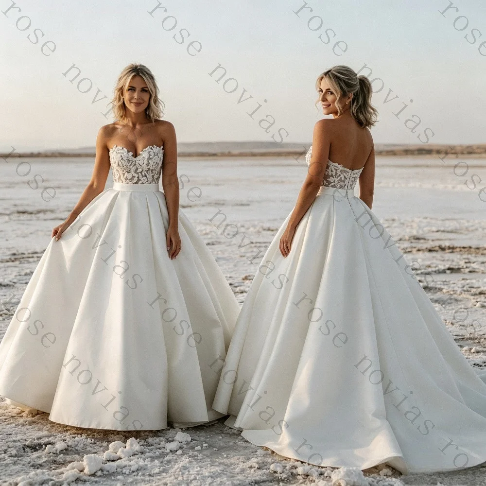 Customized 2026 Elegant Strapless Satin Princess Fluffy Wedding Dresses Luxurious Backless Lace Applique Ruffled Bridal Gown