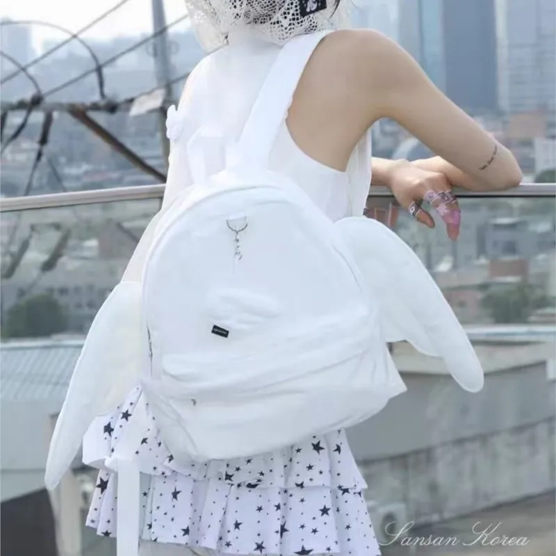 

Japanese Harajuku Wave Point Backpack Women Solid Color Angel Wings Large Capacity Daypack Ladies Sweet Cute Mochilas Mujer 2025