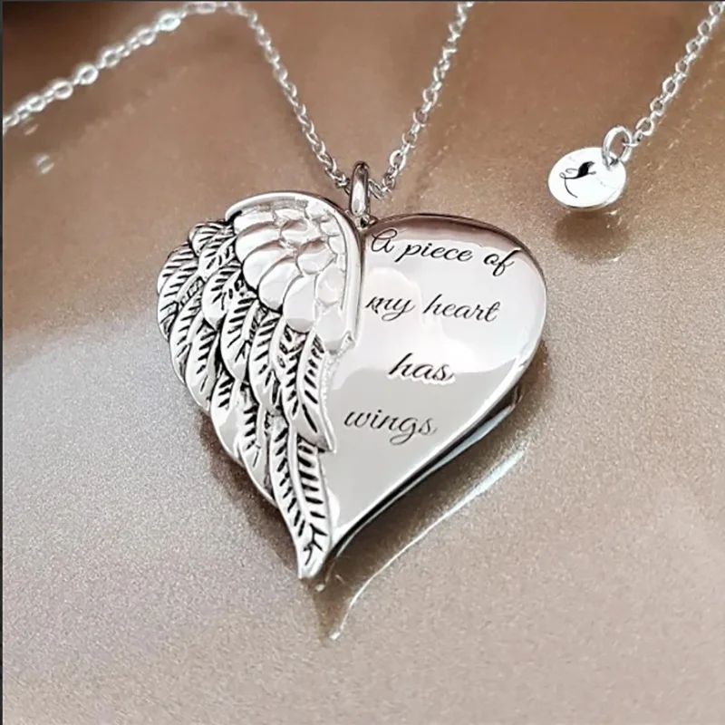2024 A Piece of My Heart Has Wings Pendant European American Angel Wings Engraved Necklace Jewelry Necklace for Women