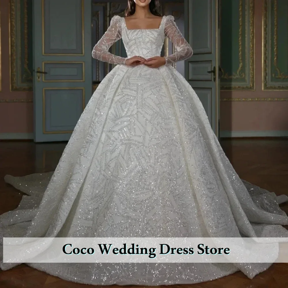 فستان زفاف رائع مخصص برقبة مربعة مزين بالترتر اللامع وأكمام طويلة فستان العروس فيستدو دي نوفيا