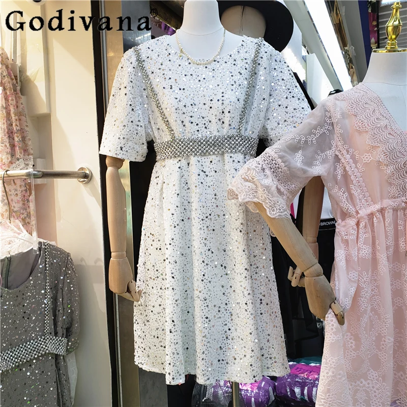 ชุดเดรสทรงเอไลน์แขนพองแต่งเลื่อมสไตล์ยุโรปเก๋ไก๋ไม่ซ้ำใคร เอวสูงทรงหลวม คอกลม ใส่สบายสำหรับผู้หญิง ฤดูร้อน รุ่นใหม่
