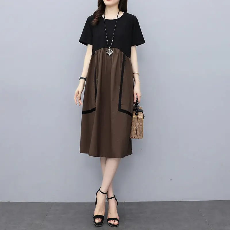 

Fashion O-Neck Spliced Pockets Loose Folds Casual Dress Women's Clothing 2024 Summer New Oversized Commuter Short Sleeve Dress