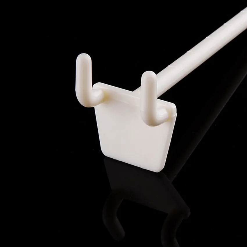 100 Piezas de Ganchos de Plástico para Exhibición de Productos en Panel Perforado, Ganchos Blancos para Almacenamiento, Estantes para Mercancías, Supermercados y Tiendas