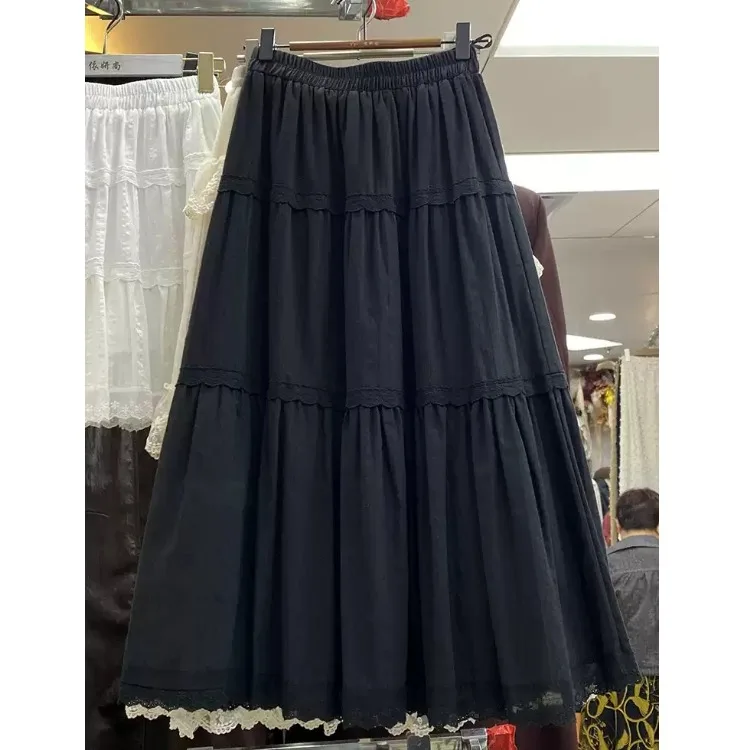 Gonna a trapezio da donna nuova primavera Sle con patchwork di pizzo ricamato Gonna torta con bottoni in puro colore a vita media in misto cotone