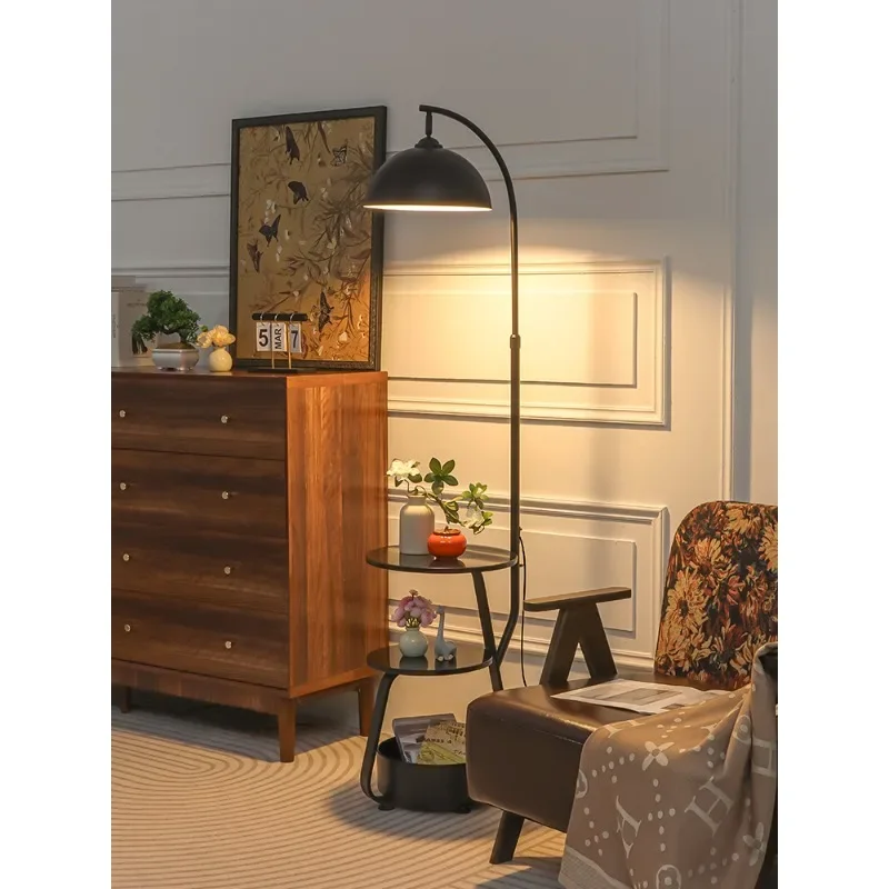Modern simple floor lamp, a few objects next to the sofa in the living room, high-grade cream wind bedroom bedside