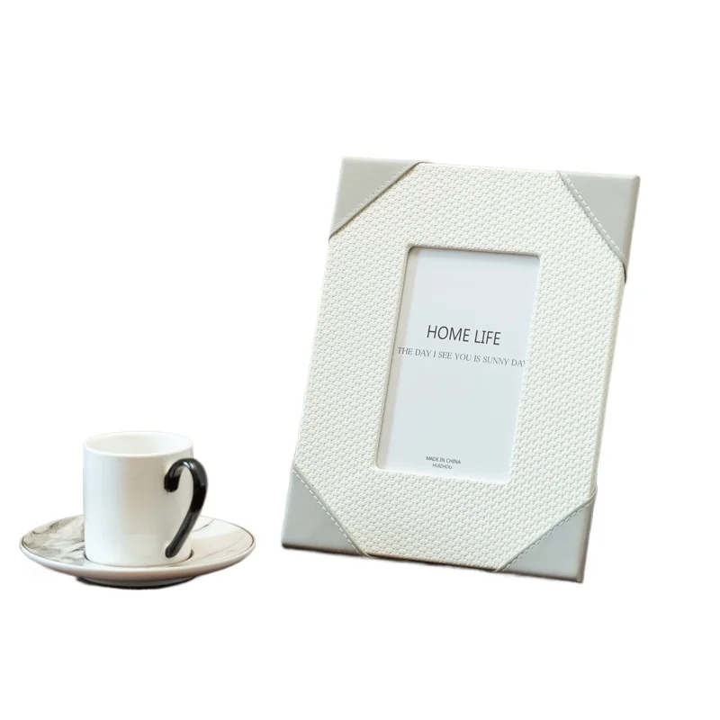 Home model room, living room, sofa corners, creative photo frame table, high-end niche ornament