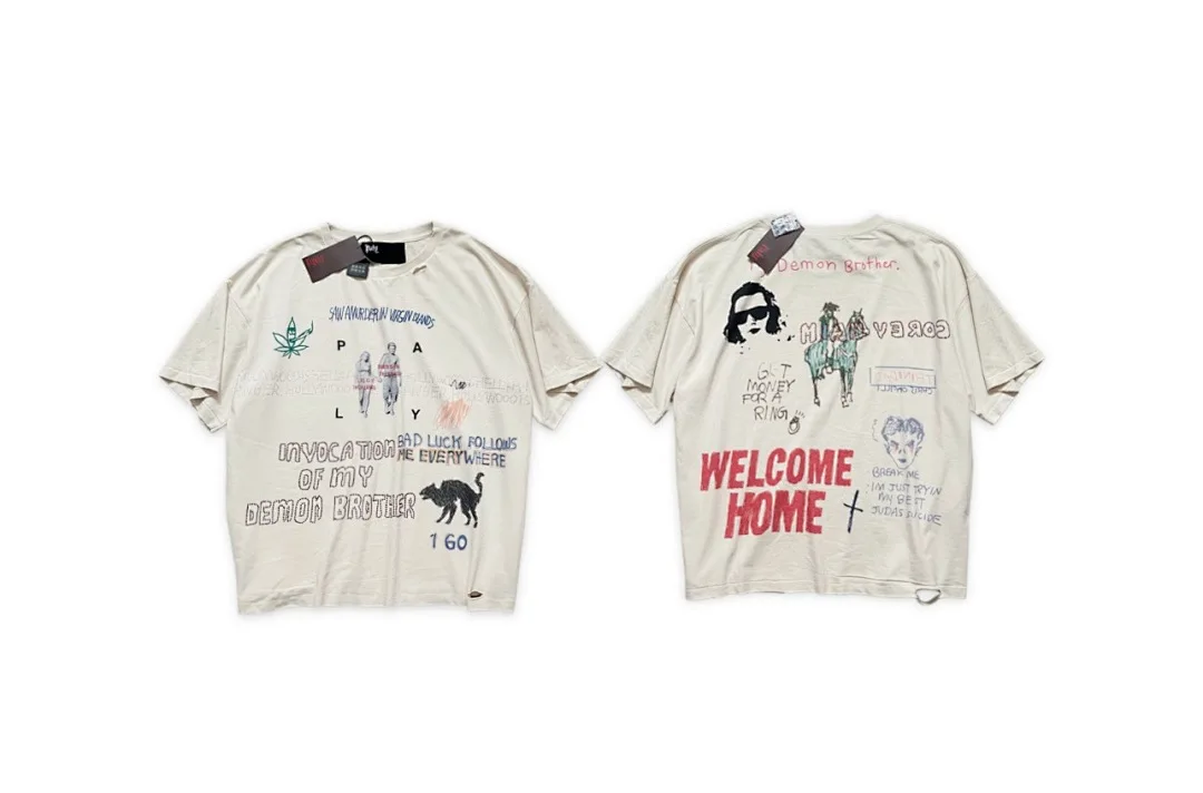 26ss Paly Tees Men Vintage Cream Distressed Tee Black Cat Rhinestone Letter Figure Graffiti Print Oversized Loose Street T-shirt