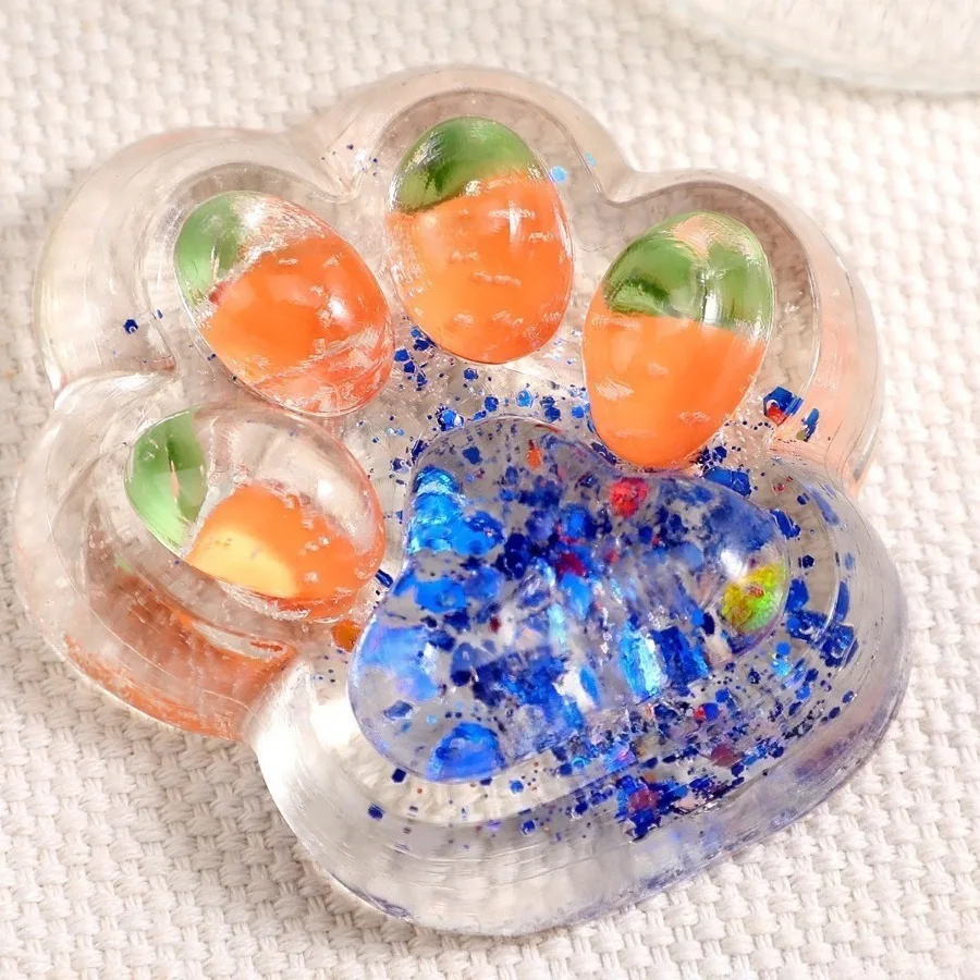 

High-value three-color rainbow cat paw pinch music, decompression toy mud sticky bag decompression artifact