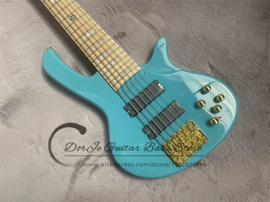 6 strings bass guitar ash wood body Maple Neck white shell inlaid with Golden Bridge active battery case blue and green bass