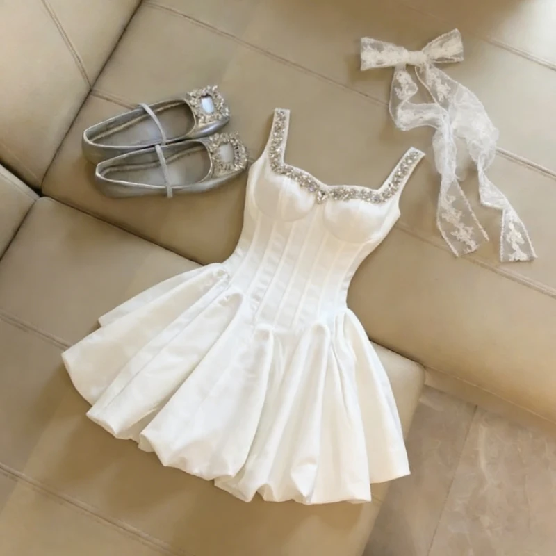Robe d'été élégante en dentelle pour femme, style chic, avec nœud et volants, mini-robe de princesse pour anniversaire et événements
